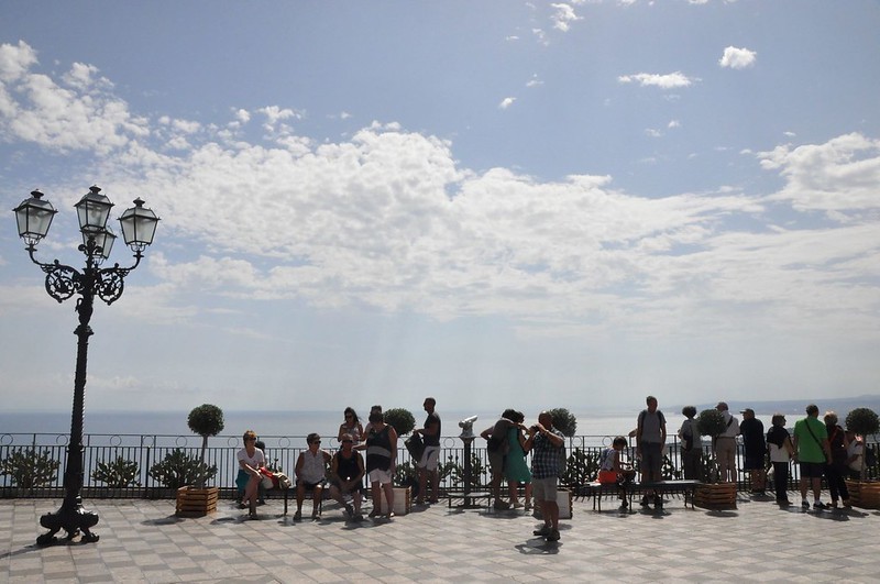 Best Things To Do in Sicily | View of people overlooking the Ionian Sea from Piazza XI Aprile